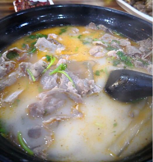 Here's a bowl of sheep soup you ordered. Please check it carefully.